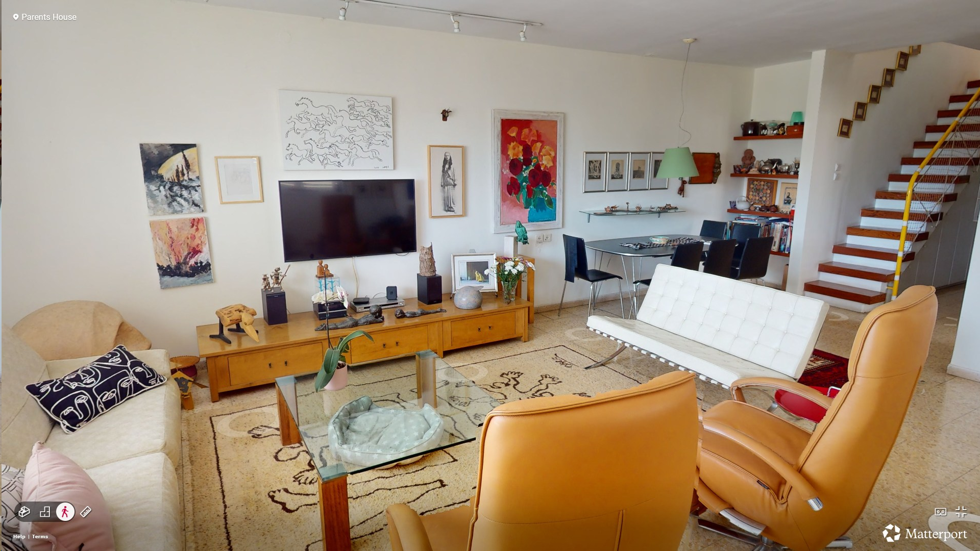 A family living room filled with art, furniture and memories